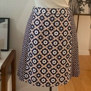 Boden  A-line skirt with mixed peach, black and white geometric and floral print